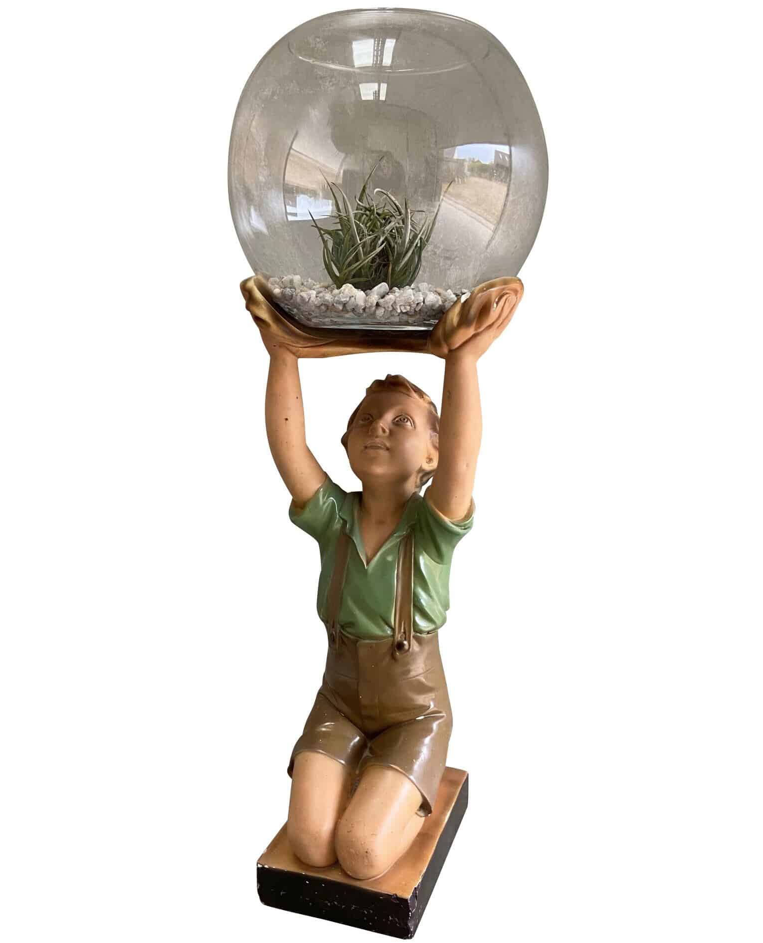 Young Boy Holding a Glass Fish Bowl