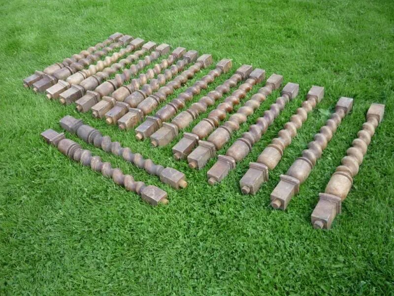 A set of 18 antique oak barley twist table legs - 4194