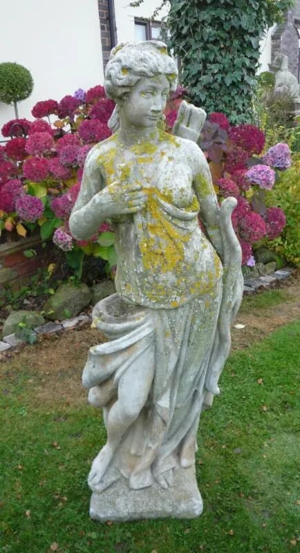 A large vintage reconstitutred stone female hunter figure - 4349