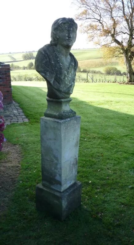 A vintage chilstone bust of a Roman god on a pedestal - 4326
