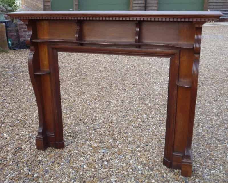 Antique solid oak fire surround