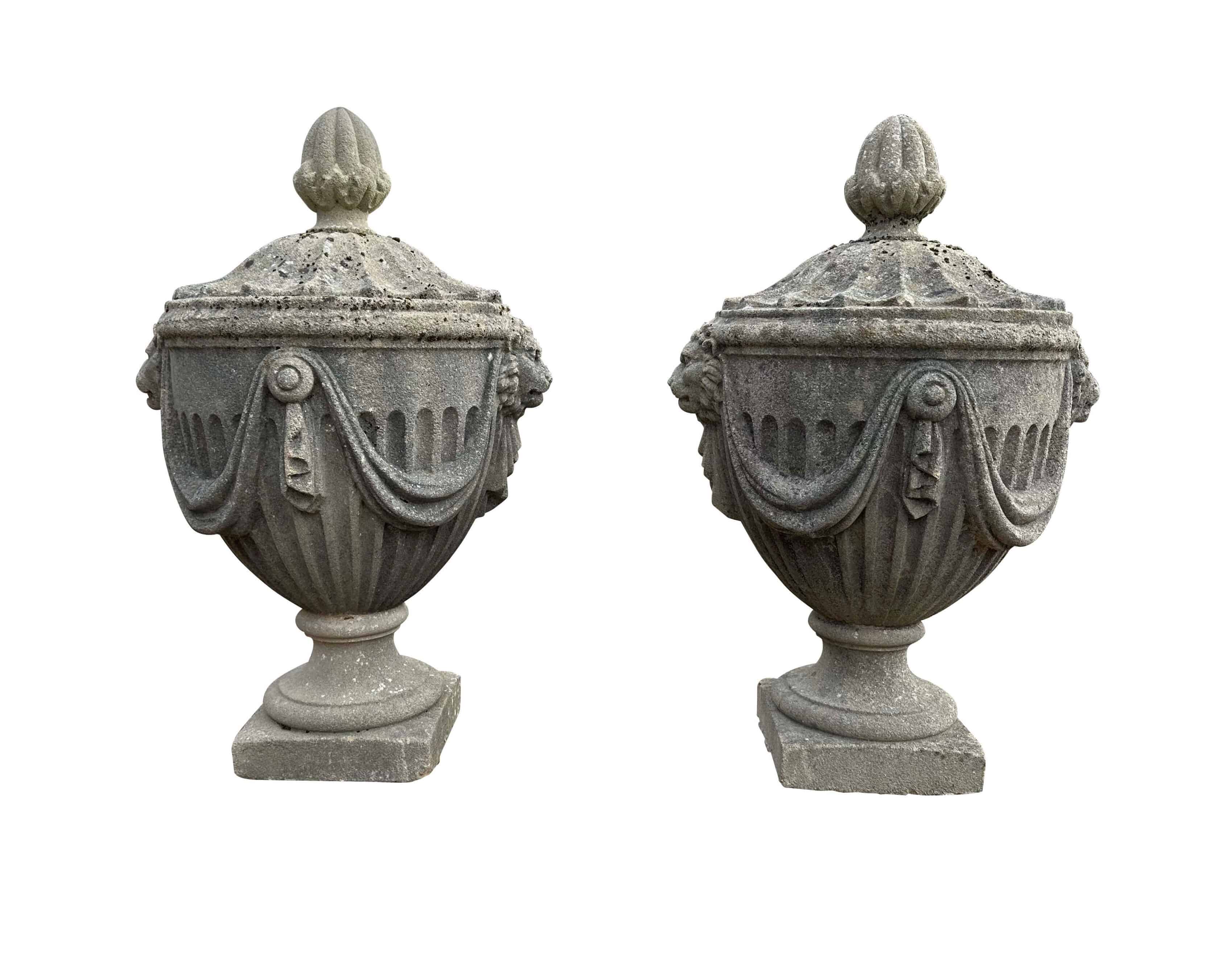 Pair of Reconstituted Stone Lions Head and Drapery Finials