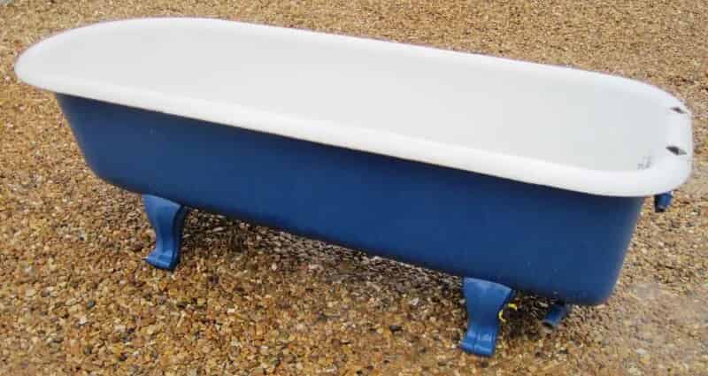 Reclaimed antique roll top cast iron bath