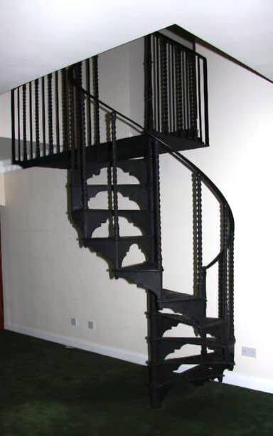 Reclaimed cast iron spiral staircase with a balcony - 4399