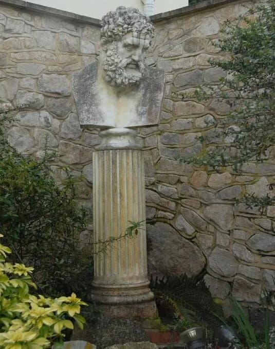 A large Bust of Hercules on a plinth - 4771