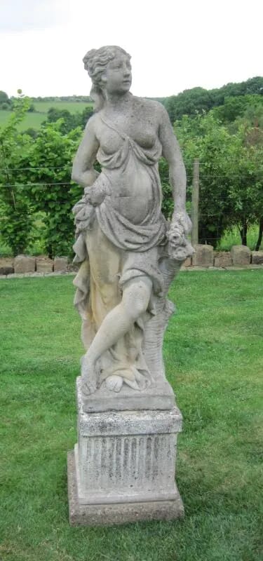 Garden Statue of a semi nude Maiden on a plinth - 4764