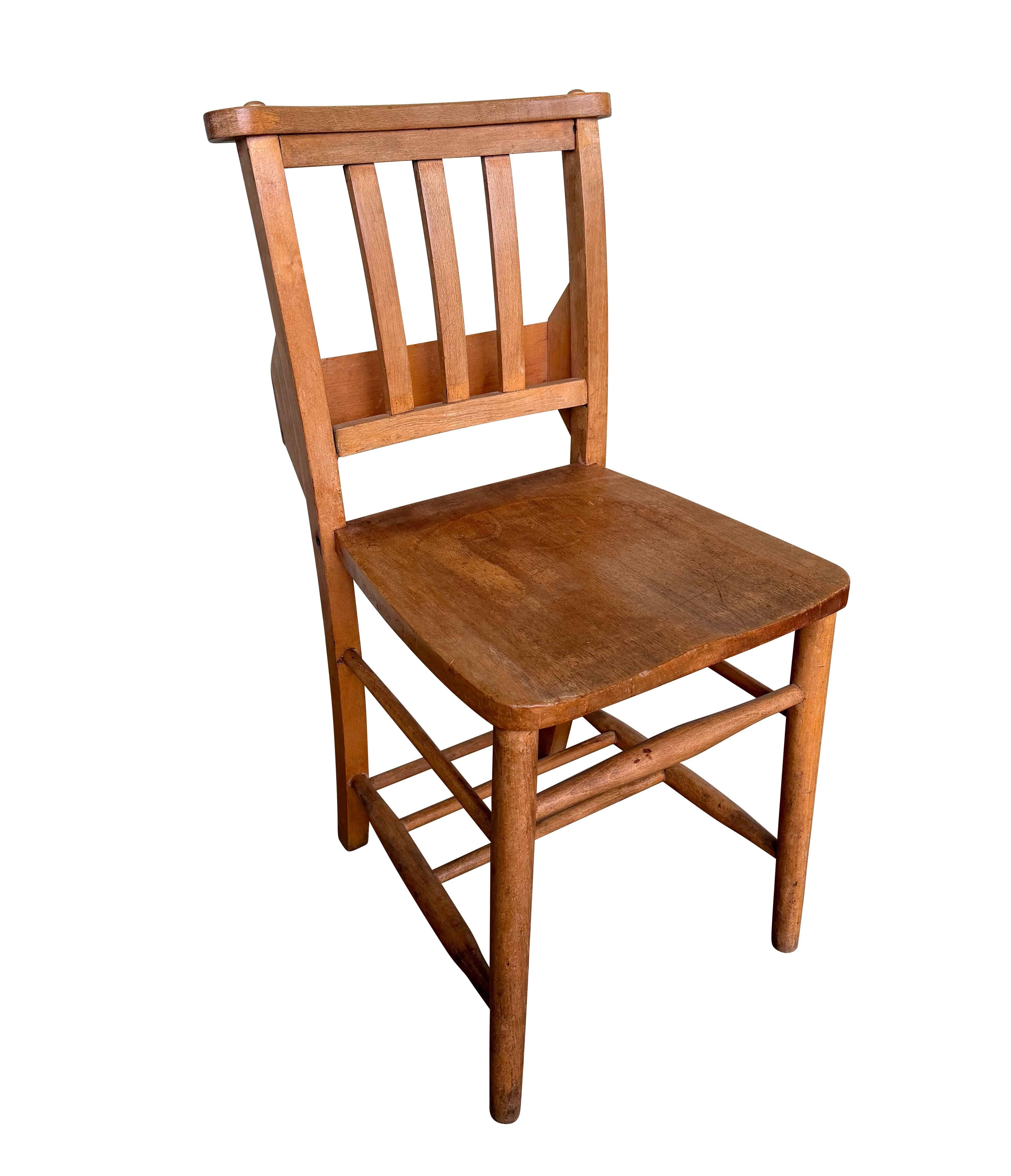 Salvaged church wooden chapel chairs with book holder