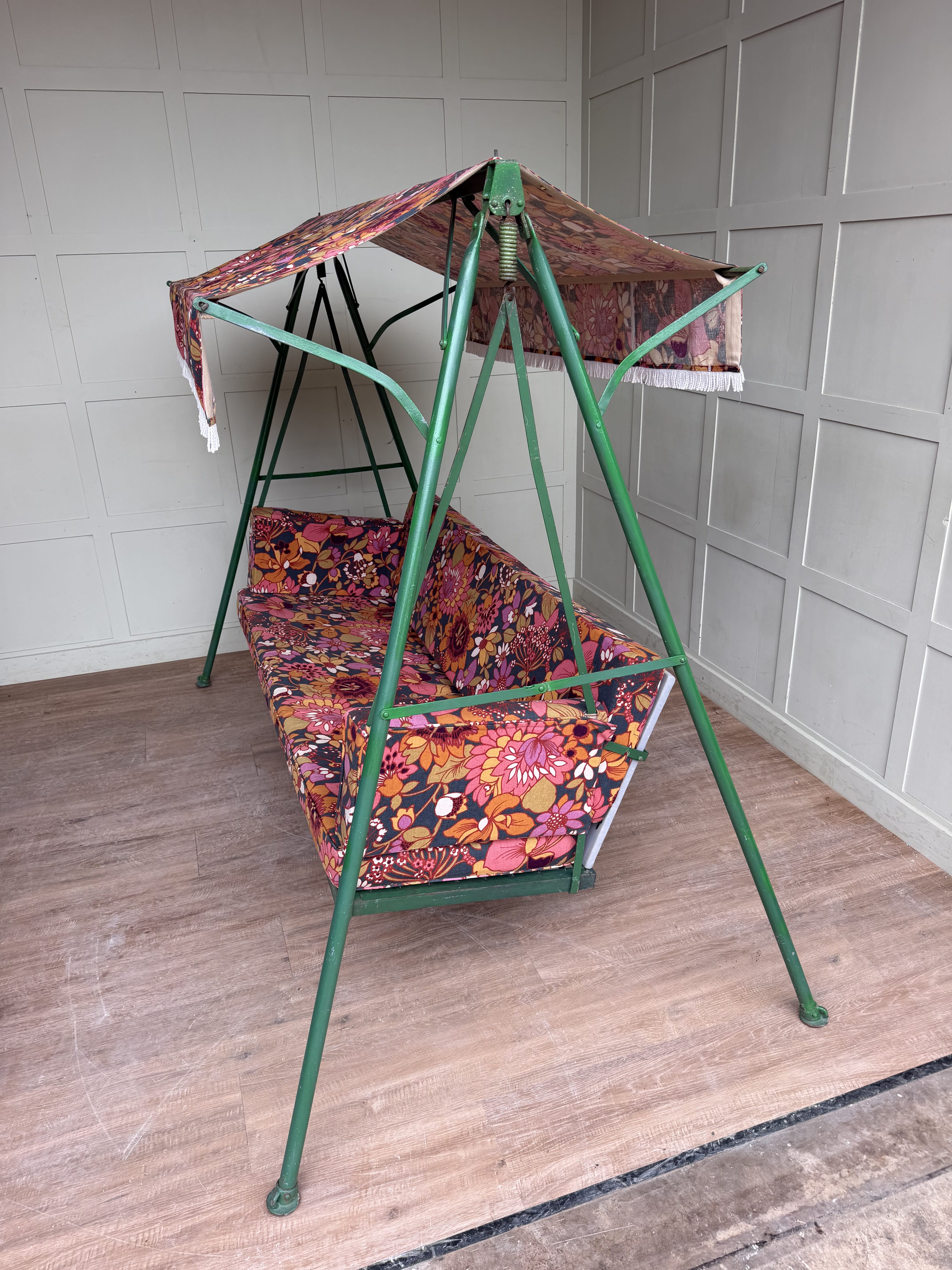 Original upholstery and metal frame swing