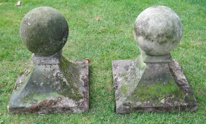 A pair of Weathered Stone Gate Pier Ball Finials - 5039