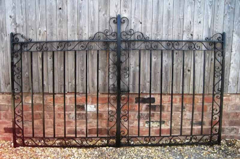 Pair of Salvaged Wrought Iron Gates with hinges and stays