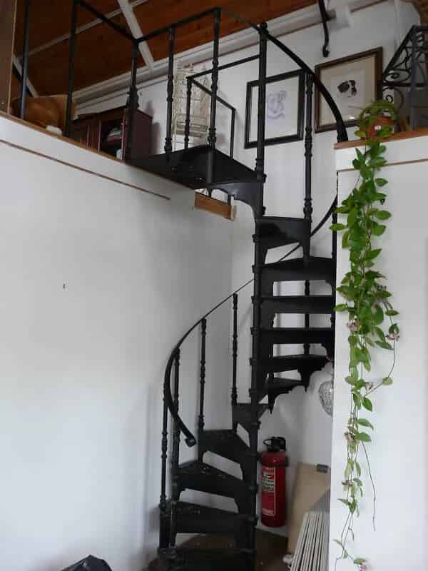 Salvaged Cast Metal Spiral Staircase with top Balcony