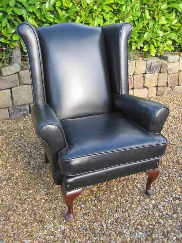 Antique Black Leather Wing Back Chair