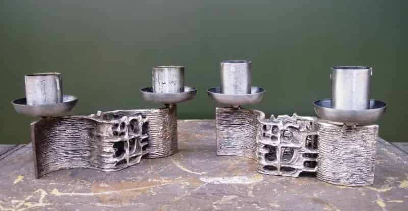 Pair of White Metal Sculpted Candlesticks