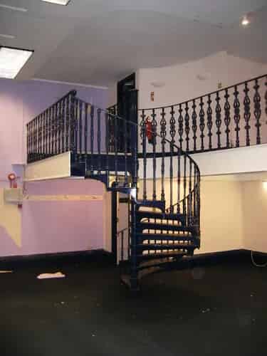 Reclaimed Cast Iron Spiral Staircase with 4 Top Rails