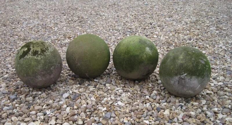 A Set of 4 Composition Stone Balls - 5513
