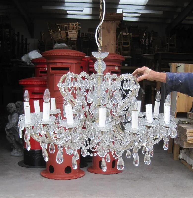 A Venetian moulded and cut glass sixteen light chandelier - 5634