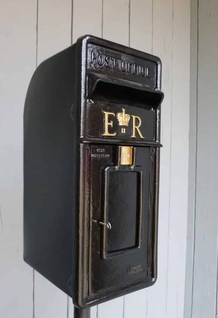 This is an Original British Post Box made with a cast iron front Painted Black