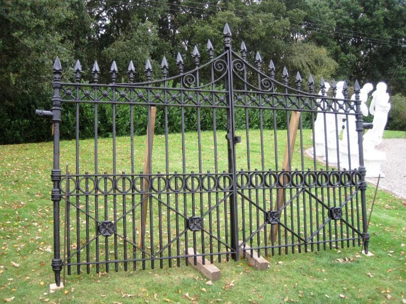Pair of Antique Cast Iron Gates with Stone Posts - 5452