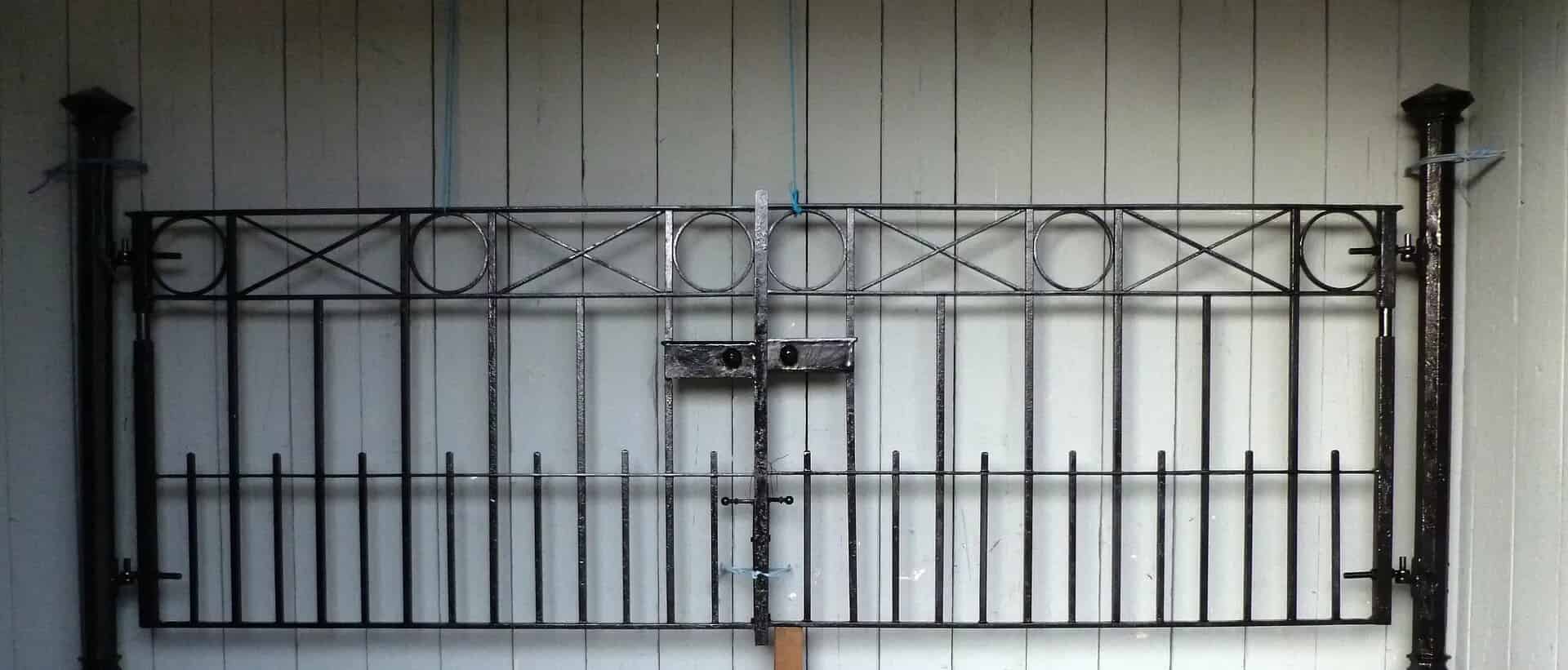 Pair of Antique Wrought Iron Gates and Posts