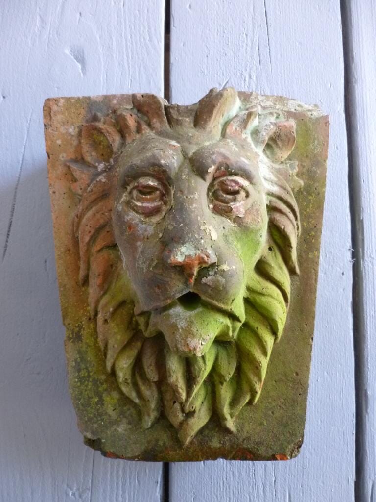 A Victorian Terracotta wall mounted Lion water fountain - 6758