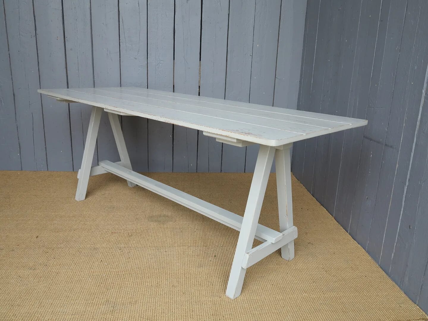 Distressed trestle store dining table