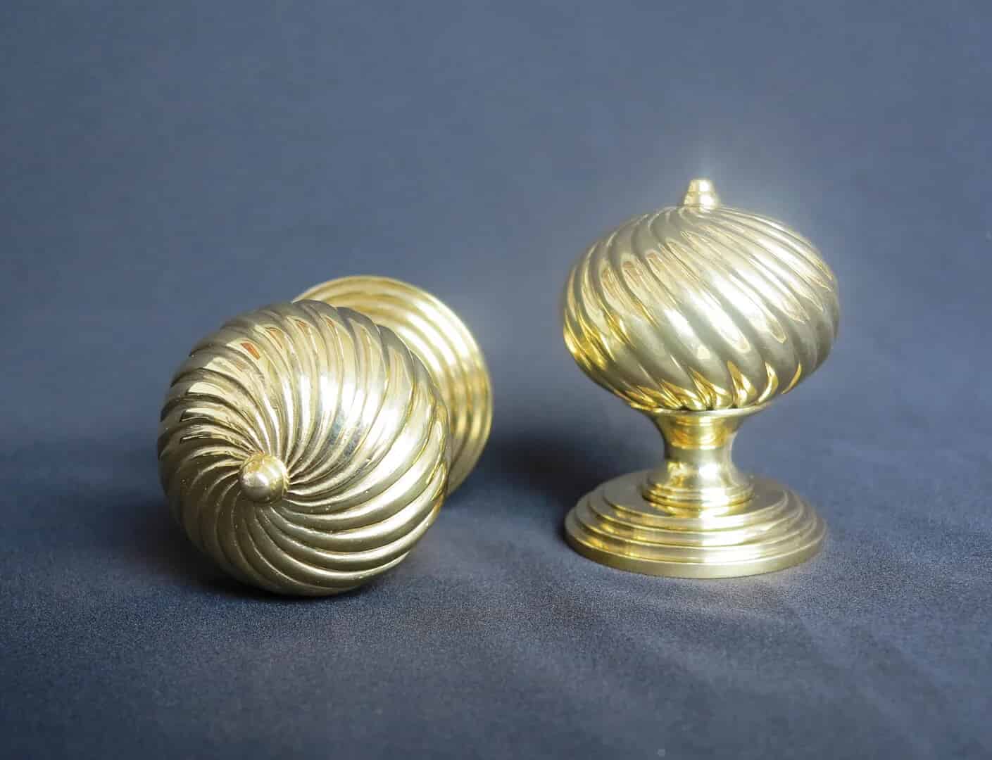 This is a Pair of Twisted Burcot Door Knobs