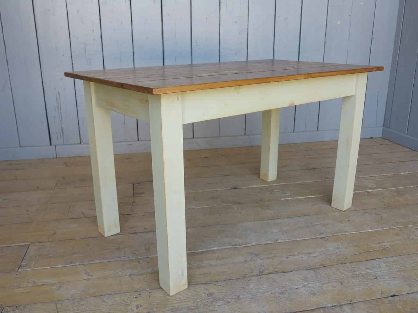 Reclaimed Floorboard Table with a Distressed Base