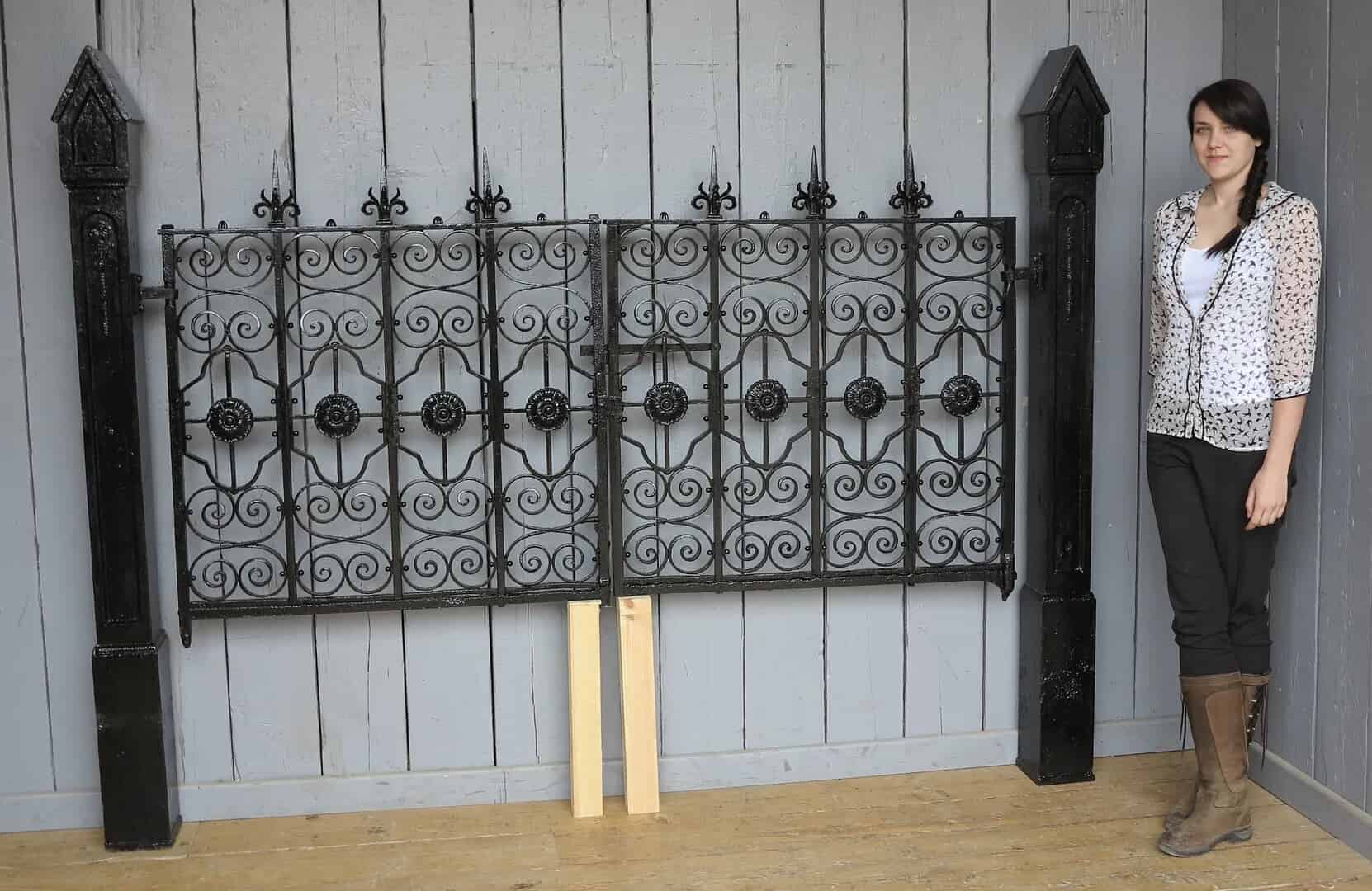 Pair of Antique Gothic Wrought Iron Gates with Cast Iron Posts