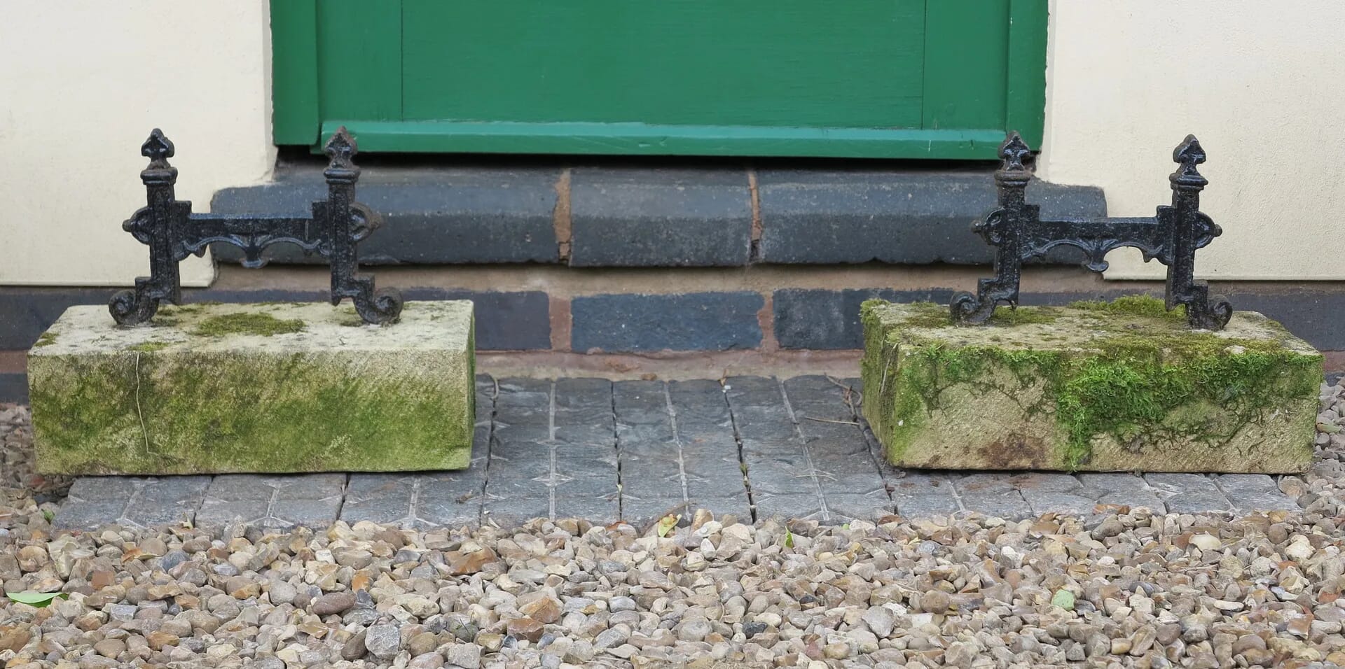 Wrought Iron Gothic Boot Scrapers on Carved Stone Bases - D1259