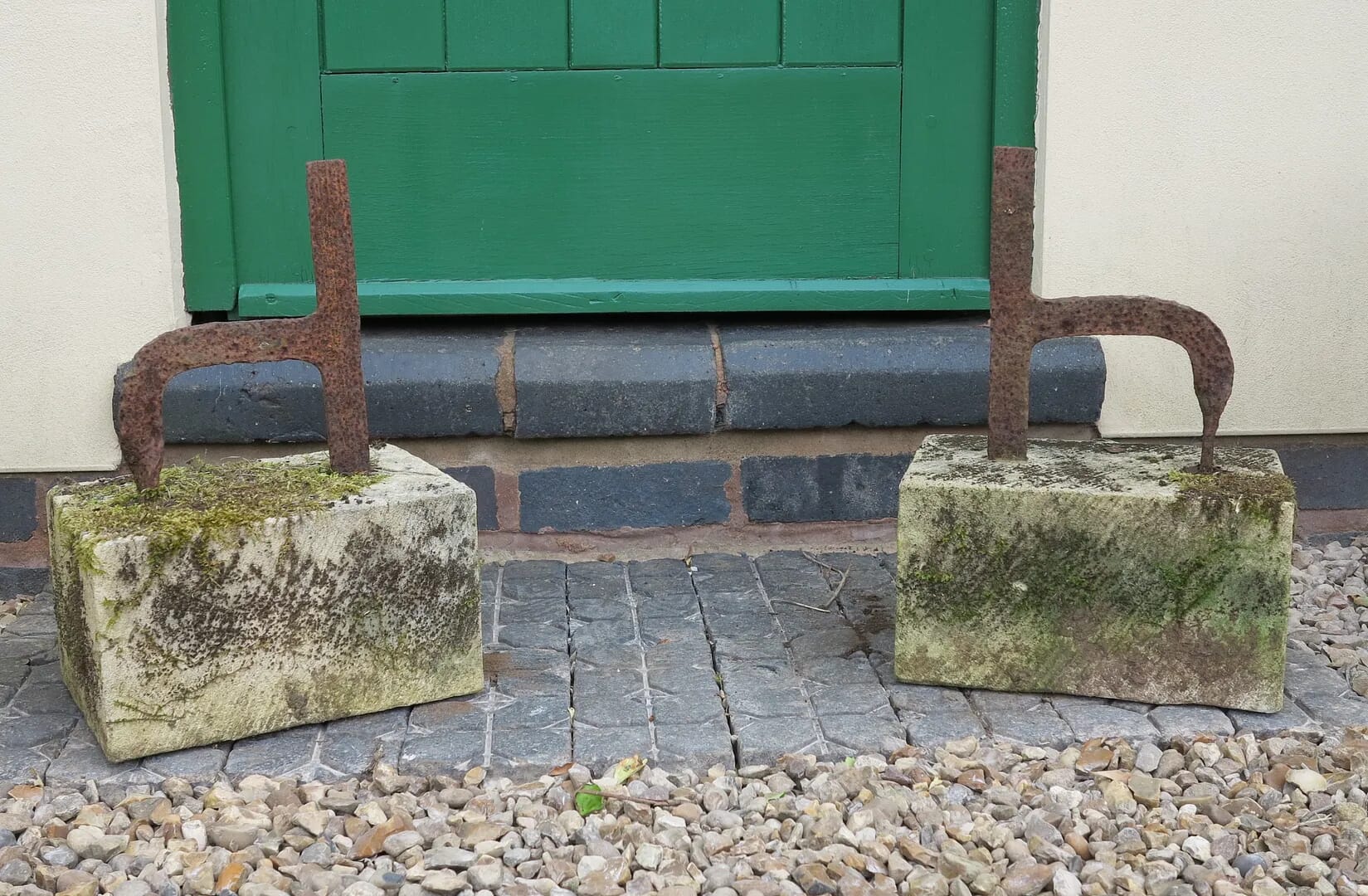 Pair Of Outdoor Wrought Iron Boot Scrapers on Stone Bases - 8948